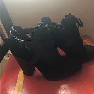 Strapped black boots